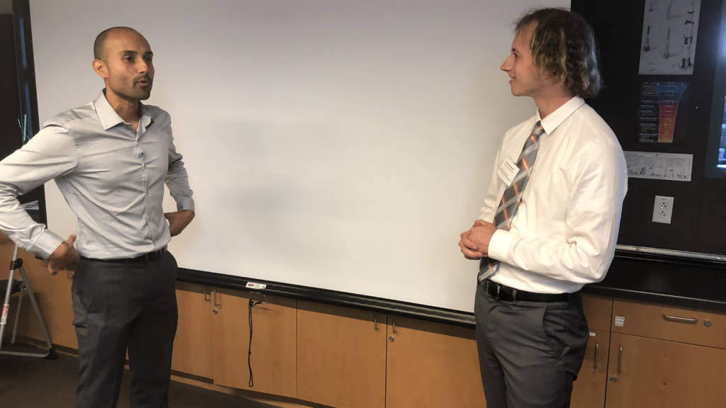 Ranjit Deshmukh PhD (Berkeley Lab) and Zach Erickson (Caltech) take part in networking role-play fun ahead of the CCST Climate Science Translators Showcase.  The California Council on Science and Technology (CCST) hosted the CCST Climate Science Translators Showcase on Tuesday, September 11, 2018 at the Exploratorium as an Affiliate Event of the historic Global Climate Action Summit in San Francisco — held during the "Celebration of Science and Education" reception hosted by the Governor's Office of Planning and Research (OPR), CCST, the Gordon and Betty Moore Foundation, CalEPA, and Ten Strands. The #CCSTShowcase recruited and trained 12 graduate students and postdocs from California universities and research institutions to communicate their climate-related research to policy leaders, staff, and other Summit delegates.