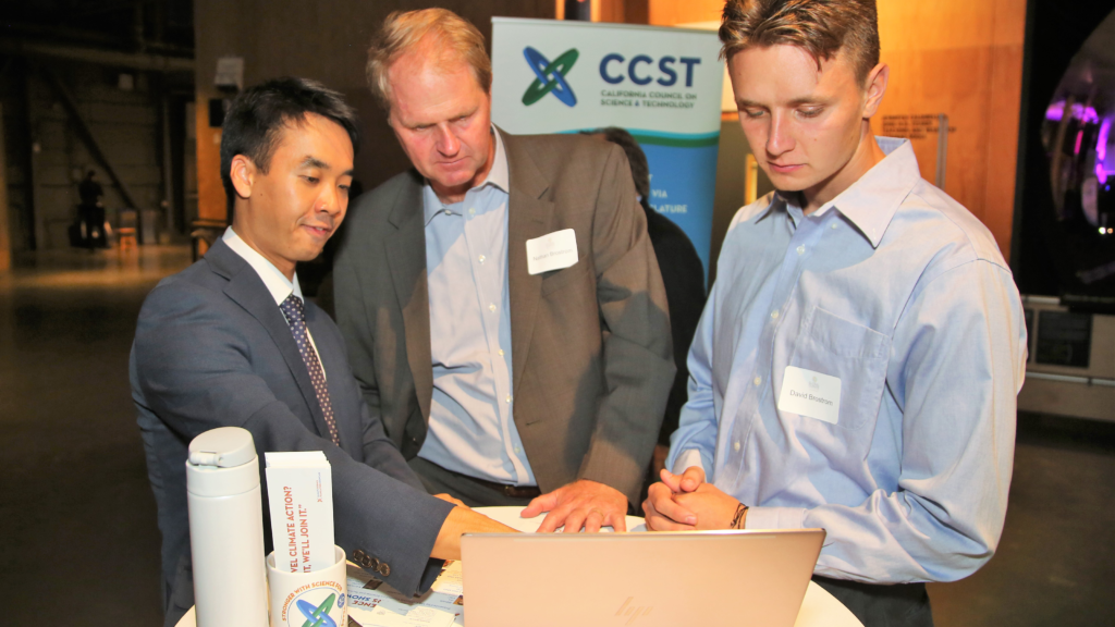 University of Southern California doctoral student Brian Y. An explains his research on the diffusion of climate policies across Southern California municipalities.  The California Council on Science and Technology (CCST) hosted the CCST Climate Science Translators Showcase on Tuesday, September 11, 2018 at the Exploratorium as an Affiliate Event of the historic Global Climate Action Summit in San Francisco — held during the "Celebration of Science and Education" reception hosted by the Governor's Office of Planning and Research (OPR), CCST, the Gordon and Betty Moore Foundation, CalEPA, and Ten Strands. The #CCSTShowcase recruited and trained 12 graduate students and postdocs from California universities and research institutions to communicate their climate-related research to policy leaders, staff, and other Summit delegates.