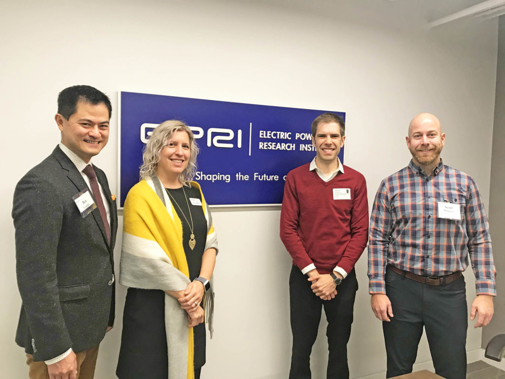 Alumni of the Duke University Nicholas School of the Environment at the EPRI-EPIC workshop "Data Science Solutions to Environmental Challenges in the Electric Power Industry" hosted at EPRI offices in Washington DC, Friday, November 8, 2019. Left to Right: Communications consultant and workshop emcee Ben Young Landis (MEM '09); EPRI Senior Technical Leader and workshop organizer Becca Madsen (MEM '06); Duke University Energy Data Analyticis Lab Director and workshop speaker Kyle Bradbury (PhD '13); and American Electric Power Director of Air Quality Services and workshop participant Scott Weaver (MEM '05). (Photo by Tammi Clark/EPRI)