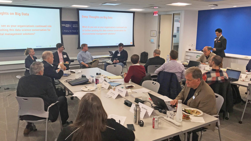 Attendees listen to moderated panel during the EPRI-EPIC workshop "Data Science Solutions to Environmental Challenges in the Electric Power Industry" hosted at EPRI offices in Washington DC, Friday, November 8, 2019. Workshop emcee Ben Young Landis is speaking to panelists (left to right): Misti Sporer of Duke Energy; Nathan Pavlovic of Sonoma Technologies Inc.; Tim Male of Environmental Policy Innovation Center; Christian Newman of EPRI. (Photo by Becca Madsen/EPRI)